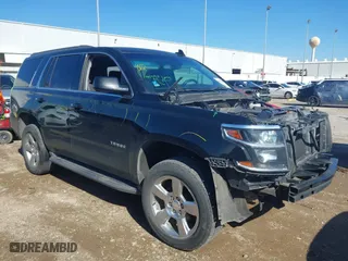 2017 Chevrolet Tahoe LS with VIN 1GNSCAKC8HR360581, listed as a IAAI auction lot 41365169 with 137,369 mi miles. Bid and sale history available at carsss.com. Image 1.