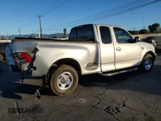 2001 Ford F-150 XL with VIN 2FTRX07L51CA91232, listed as a Copart auction lot 88556635 with 268,582 mi miles and Salvage Title. Bid and sale history available at carsss.com. Image 3.