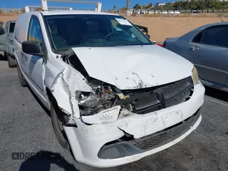 2014 Ram Cargo Van Tradesman with VIN 2C4JRGAG3ER379605, listed as a IAAI auction lot 40914636 with 156,793 mi miles. Bid and sale history available at carsss.com. Image 6.