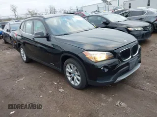 2014 BMW X1 xDrive28i with VIN WBAVL1C5XEVY16666, listed as a IAAI auction lot 41924589 with 98,731 mi miles. Bid and sale history available at carsss.com. Image 1.