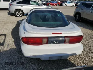 1997 Pontiac Firebird Firebird z VIN 2G2FS22K5V2232134, wystawiony jako Copart lot #74087964 z przebiegiem Nie podano mil oraz Szkody całkowita. Historia ofert i sprzedaży dostępna na DreamBid. Obrazek 6.
