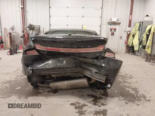 2013 Lincoln MKZ с VIN 3LN6L2GK1DR817922, выставлен на аукционе IAAI как лот 41315599 с пробегом 89 463 миль миль и . История ставок и продаж доступна на DreamBid. Изображение 16.