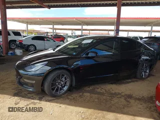 2022 Tesla Model 3 Long Range with VIN 5YJ3E1EB3NF257077, listed as a IAAI auction lot 42086629 with Not Provided miles and . Bid and sale history available at DreamBid. Image 13.
