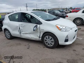 2014 Toyota Prius One with VIN JTDKDTB32E1084491, listed as a IAAI auction lot 41293744 with 132,110 mi miles and . Bid and sale history available at DreamBid. Image 13.