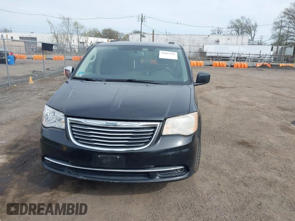 2014 Chrysler Town & Country Touring-L with VIN 2C4RC1CG2ER214952, listed as a IAAI auction lot 42083166 with 188,494 mi miles. Bid and sale history available at carsss.com. Image 6.