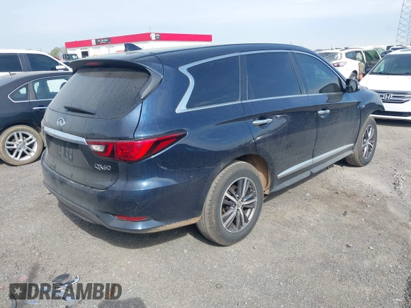 2018 Infiniti QX60 with VIN 5N1DL0MM7JC526658, listed as a IAAI auction lot 41892761 with 145,889 mi miles and . Bid and sale history available at DreamBid. Image 4.