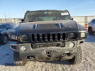 2005 Hummer H2 SUT with VIN 5GRGN22U85H109003, listed as a Copart auction lot 76557734 with 115,249 mi miles and Salvage Title. Bid and sale history available at carsss.com. Image 5.
