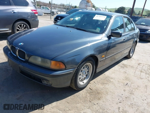 2000 BMW 5 Series 528iA with VIN WBADM6343YGV01651, listed as a IAAI auction lot 41745574 with 143,898 mi miles. Bid and sale history available at carsss.com. Image 17.