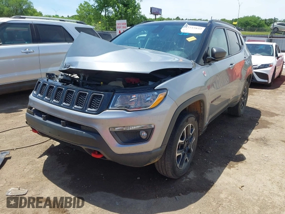 2020 Jeep Compass Trailhawk with VIN 3C4NJDDB7LT159532, listed as a IAAI auction lot 42243833 with 118,566 mi miles and . Bid and sale history available at DreamBid. Image 2.