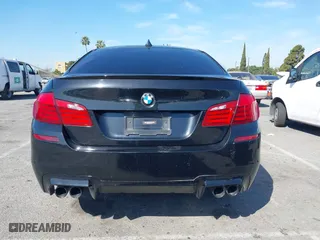 2013 BMW M5 with VIN WBSFV9C54DC772568, listed as a IAAI auction lot 41866486 with 99,072 mi miles. Bid and sale history available at carsss.com. Image 16.
