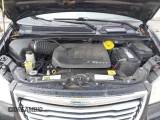 2014 Chrysler Town & Country Touring with VIN 2C4RC1BG4ER469409, listed as a IAAI auction lot 41919315 with 135,894 mi miles. Bid and sale history available at carsss.com. Image 10.