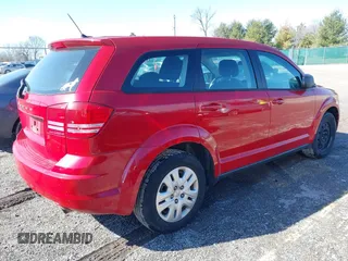 2014 Dodge Journey American Value Pkg with VIN 3C4PDCAB8ET170668, listed as a IAAI auction lot 41662590 with 167,776 mi miles. Bid and sale history available at carsss.com. Image 4.
