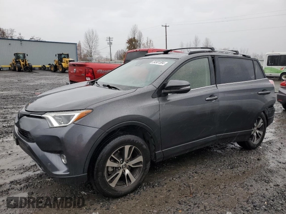 2018 Toyota RAV4 XLE with VIN JTMRFREV0JJ200337, listed as a Copart auction lot 84901594 with 57,301 mi miles and Salvage Title. Bid and sale history available at DreamBid. Image 1.