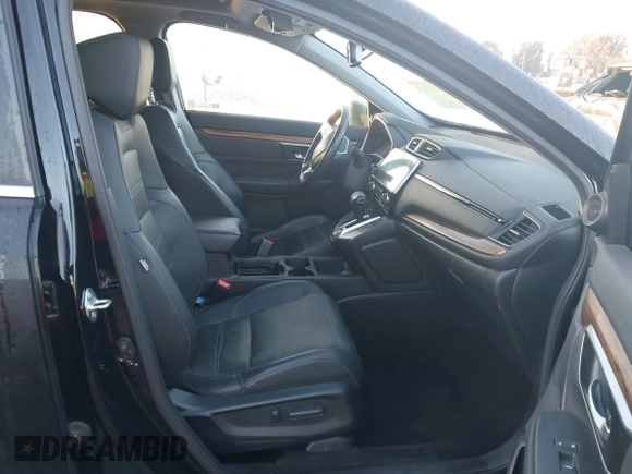 2019 Honda CR-V Touring with VIN 7FARW2H9XKE012394, listed as a IAAI auction lot 41092564 with 49,527 mi miles and . Bid and sale history available at DreamBid. Image 5.
