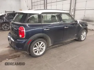2014 MINI Countryman S with VIN WMWZC5C56EWP38017, listed as a IAAI auction lot 42287308 with 151,780 mi miles and . Bid and sale history available at DreamBid. Image 4.