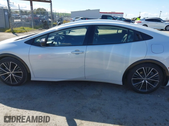 2023 Toyota Prius LE with VIN JTDACAAUXP3012538, listed as a IAAI auction lot 41948103 with 33,338 mi miles and . Bid and sale history available at DreamBid. Image 14.