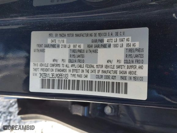 2018 Mazda Mazda3 5-Door Touring with VIN 3MZBN1L36JM265183, listed as a IAAI auction lot 41581779 with 72,410 mi miles. Bid and sale history available at carsss.com. Image 9.