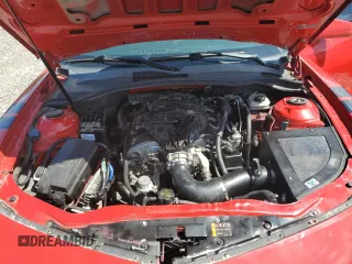 2013 Chevrolet Camaro LS z VIN 2G1FE1E32D9207577, wystawiony jako Copart lot #57692525 z przebiegiem 89 453 mil mil oraz Czysty tytuł • Clean title. Historia ofert i sprzedaży dostępna na DreamBid. Obrazek 11.