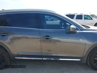 2016 Mazda CX-9 Grand Touring with VIN JM3TCADY5G0120033, listed as a IAAI auction lot 42248488 with 150,044 mi miles and . Bid and sale history available at DreamBid. Image 14.