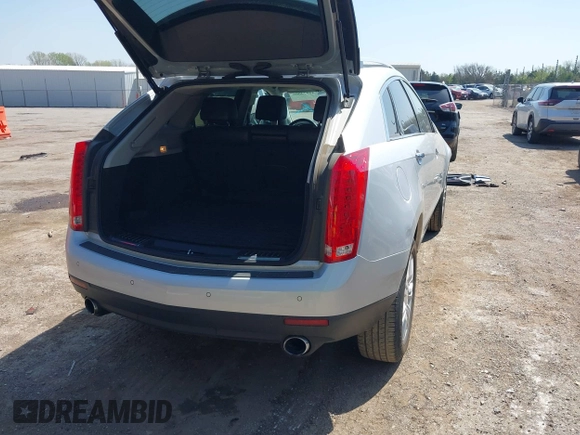 2015 Cadillac SRX Luxury Collection with VIN 3GYFNBE38FS576165, listed as a IAAI auction lot 41974066 with 95,832 mi miles. Bid and sale history available at carsss.com. Image 4.