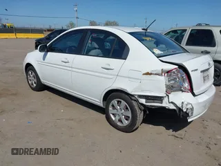 2010 Hyundai Accent GLS with VIN KMHCN4AC7AU473527, listed as a IAAI auction lot 41965592 with 104,506 mi miles. Bid and sale history available at carsss.com. Image 3.