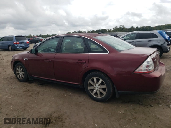 2008 Ford Taurus SEL with VIN 1FAHP24WX8G159335, listed as a Copart auction lot 74106694 with 187,710 mi miles and Salvage Title. Bid and sale history available at carsss.com. Image 2.