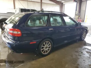 2003 Volvo V40 z VIN YV1VW27533F988646, wystawiony jako Copart lot #76371774 z przebiegiem 154 126 mil mil oraz Tytuł czysty. Historia ofert i sprzedaży dostępna na DreamBid. Obrazek 3.