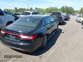 2017 Lincoln Continental Livery z VIN 1LN6L9HK3H5606334, wystawiony jako IAAI lot #42231351 z przebiegiem 247 841 mil mil oraz . Historia ofert i sprzedaży dostępna na DreamBid. Obrazek 4.