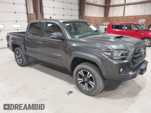 2017 Toyota Tacoma SR5 z VIN 5TFCZ5AN6HX111116, wystawiony jako IAAI lot #42054764 z przebiegiem 103 107 mil mil oraz . Historia ofert i sprzedaży dostępna na DreamBid. Obrazek 1.