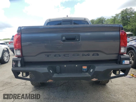 2022 Toyota Tacoma SR with VIN 3TYAX5GN2NT046114, listed as a Copart auction lot 61281875 with 57,726 mi miles and Salvage title. Bid and sale history available at DreamBid. Image 6.