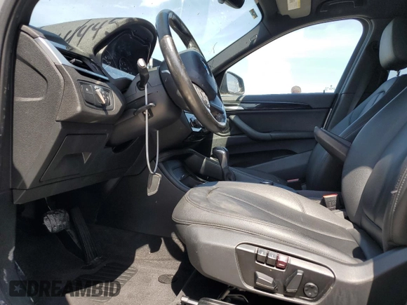 2018 BMW X1 sDrive28i with VIN WBXHU7C38J5H44459, listed as a Copart auction lot 49107553 with 96,494 mi miles and . Bid and sale history available at DreamBid. Image 7.