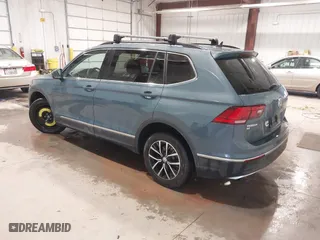 2021 Volkswagen Tiguan SE with VIN 3VV2B7AX6MM077337, listed as a IAAI auction lot 41345637 with 62,989 mi miles. Bid and sale history available at carsss.com. Image 3.