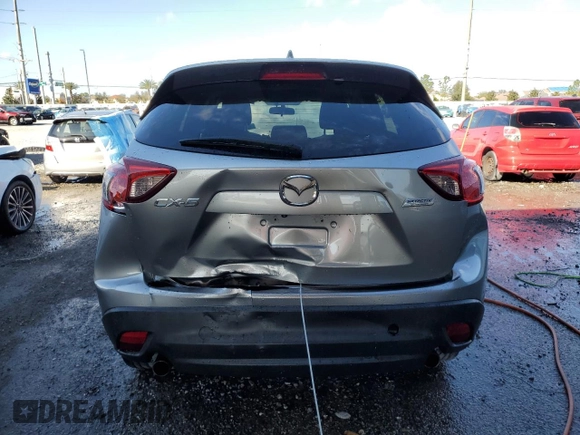 2014 Mazda CX-5 Touring with VIN JM3KE2CY8E0305641, listed as a Copart auction lot 42617165 with 107,336 mi miles and Salvage Title. Bid and sale history available at carsss.com. Image 6.