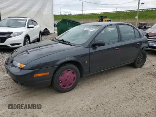 2002 Saturn SL z VIN 1G8ZH52842Z201392, wystawiony jako Copart lot #56595105 z przebiegiem Nie podano mil oraz Szkoda całkowita • Salvage title. Historia ofert i sprzedaży dostępna na DreamBid. Obrazek 1.