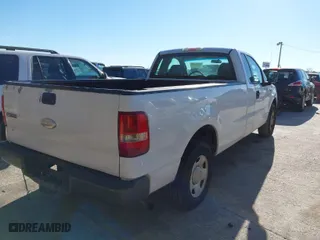 2007 Ford F-150 XL with VIN 1FTRF12W87KC81895, listed as a IAAI auction lot 41214873 with 231,058 mi miles. Bid and sale history available at carsss.com. Image 4.