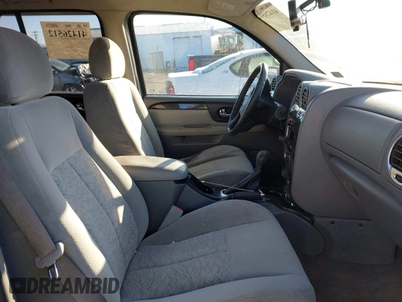 2005 GMC Envoy SLE with VIN 1GKDT13S452194933, listed as a IAAI auction lot 41426512 with 176,897 mi miles. Bid and sale history available at carsss.com. Image 5.