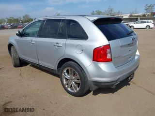 2013 Ford Edge SEL with VIN 2FMDK3JC8DBB01843, listed as a IAAI auction lot 42034502 with 165,671 mi miles. Bid and sale history available at carsss.com. Image 3.