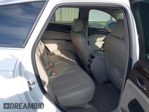 2013 Cadillac SRX Premium Collection with VIN 3GYFNJE33DS625036, listed as a IAAI auction lot 42464711 with 83,344 mi miles and . Bid and sale history available at DreamBid. Image 8.