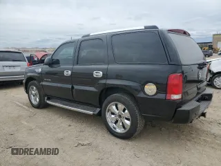 2003 Cadillac Escalade z VIN 1GYEK63N73R277166, wystawiony jako Copart lot #51797955 z przebiegiem 374 735 mil mil oraz Czysty tytuł • Clean title. Historia ofert i sprzedaży dostępna na DreamBid. Obrazek 2.