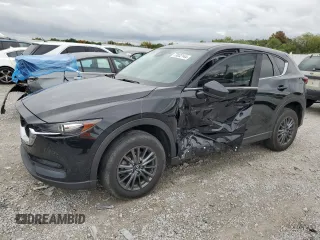 2020 Mazda CX-5 Touring with VIN JM3KFBCM1L0792706, listed as a Copart auction lot 73032144 with 56,845 mi miles and Salvage Title. Bid and sale history available at carsss.com. Image 1.