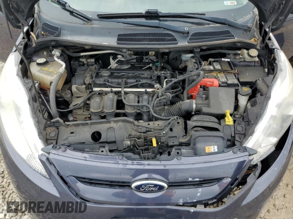 2013 Ford Fiesta S z VIN 3FADP4TJ6DM164936, wystawiony jako Copart lot #55470645 z przebiegiem 105 535 mil mil oraz Szkoda całkowita • Salvage title. Historia ofert i sprzedaży dostępna na DreamBid. Obrazek 11.