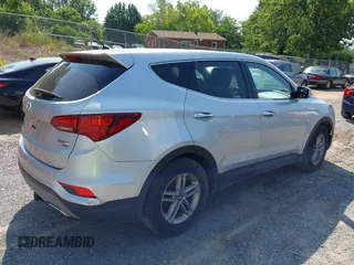 2018 Hyundai Santa Fe 2.4L z VIN 5XYZTDLB1JG546708, wystawiony jako IAAI lot #42399917 z przebiegiem 131 932 mil mil oraz . Historia ofert i sprzedaży dostępna na DreamBid. Obrazek 6.