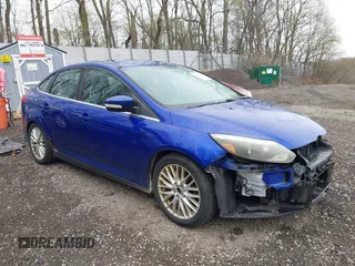 2014 Ford Focus Titanium with VIN 1FADP3J28EL240911, listed as a IAAI auction lot 42082812 with 144,625 mi miles. Bid and sale history available at carsss.com. Image 1.