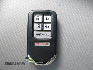 2014 Honda Odyssey EX-L with VIN 5FNRL5H67EB073640, listed as a IAAI auction lot 41115124 with 99,841 mi miles and . Bid and sale history available at carsss.com. Image 11.
