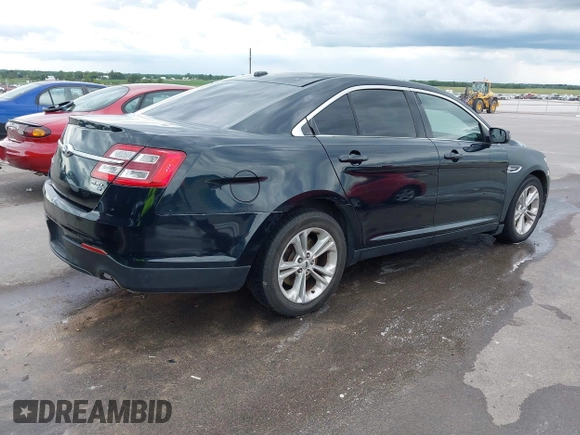 2015 Ford Taurus SEL with VIN 1FAHP2H85FG108575, listed as a IAAI auction lot 42514846 with 209,478 mi miles and . Bid and sale history available at DreamBid. Image 4.