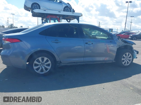 2023 Toyota Corolla LE z VIN JTDB4MEE4P3005736, wystawiony jako IAAI lot #41739662 z przebiegiem 28 257 mil mil oraz . Historia ofert i sprzedaży dostępna na DreamBid. Obrazek 14.