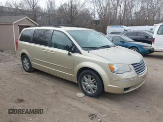 2010 Chrysler Town & Country Touring with VIN 2A4RR5DXXAR286099, listed as a IAAI auction lot 41890446 with 218,806 mi miles. Bid and sale history available at carsss.com. Image 1.