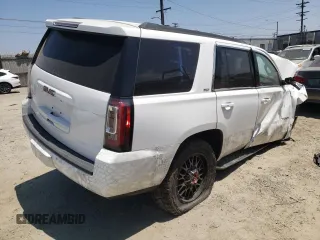 2020 GMC Yukon SLT with VIN 1GKS2BKC1LR268078, listed as a Copart auction lot 63642494 with 63,584 mi miles and Salvage Title. Bid and sale history available at carsss.com. Image 3.