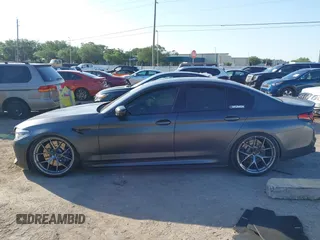 2019 BMW M5 Competition z VIN WBSJF0C59KB447419, wystawiony jako IAAI lot #41997505 z przebiegiem 74 990 mil mil oraz . Historia ofert i sprzedaży dostępna na DreamBid. Obrazek 14.