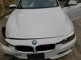 2013 BMW 3 Series 328i xDrive with VIN WBA3B5G59DNS04579, listed as a Copart auction lot 50445404 with 115,404 mi miles and Salvage title. Bid and sale history available at DreamBid. Image 11.